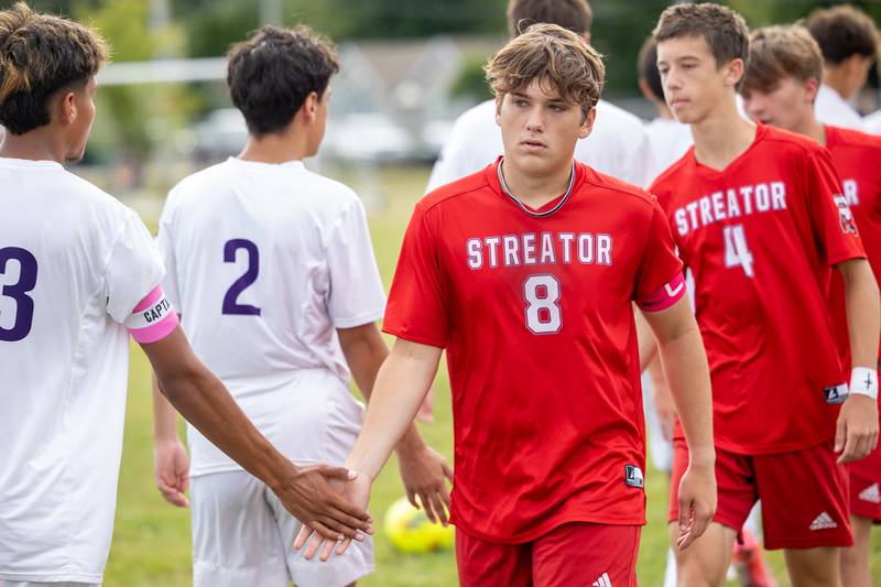 Blake Fialko (8) of Streator leads team in post game handshake line after loss to Mendota on Saturday, Aug 30, 2025 at the James Street Recreation Area in Streator.