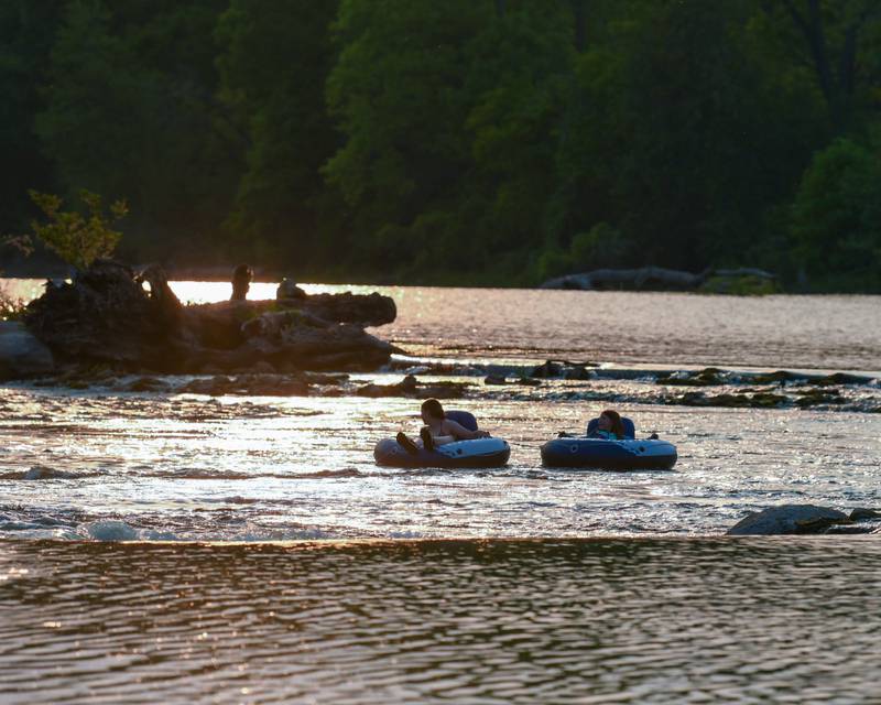 While the Summer Solstice Music festival was taking place on Friday June 23, 2023 people took advantage of the nice weather and water in rafts and floated a short distance before repeating the process.