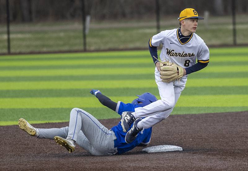 Sterling’s Danny Martinez makes the out at second over Newman’s Garret Matznick Thursday, March 26, 2026.