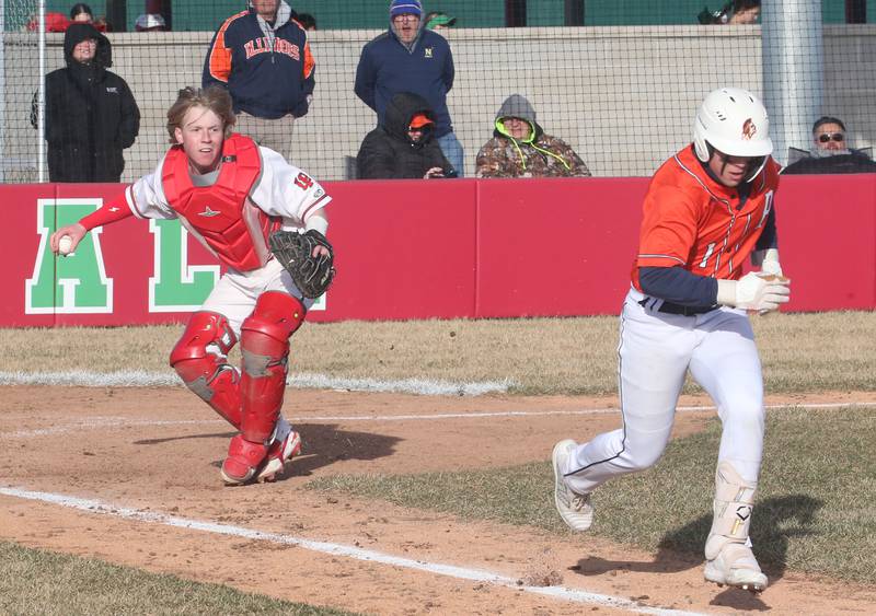 L-P catcher Brandon Lamps throws to first to force out Pontiac's Ryson Reilts on Monday, March 24, 2025 at Huby Sarver Field inside the L-P Athletic Complex in La Salle.