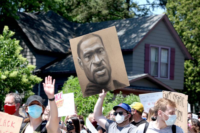 A Black Lives Matter peaceful protest and march was held in Downers Grove on June 7 in response to the killing of George Floyd, an unarmed black man while in police custody in Minneapolis last month.