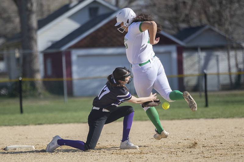 Dixon’s Kiley Gaither loses the ball while tagging Rock Falls’ Ari Reyna Tuesday, April 9, 2024 at Reynold’s field in Dixon.