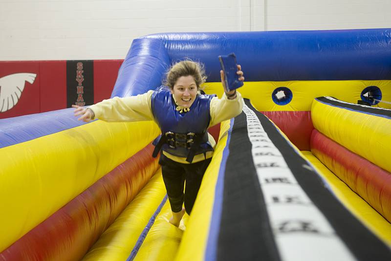 Kerrigan Hagi of Ottawa reaches out to score during an inflatable game Wednesday, April 20, 2022 at Sauk Valley Community College's Sauk Fest. The school brought in several adult-sized inflatables for the students to enjoy prior to buckling down for finals in a few weeks.