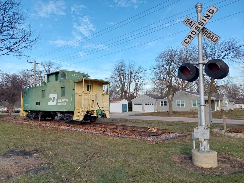 The Burlington Northern caboose is on display Wednesday, Dec. 20, 2023, at its new location in Wenona.
