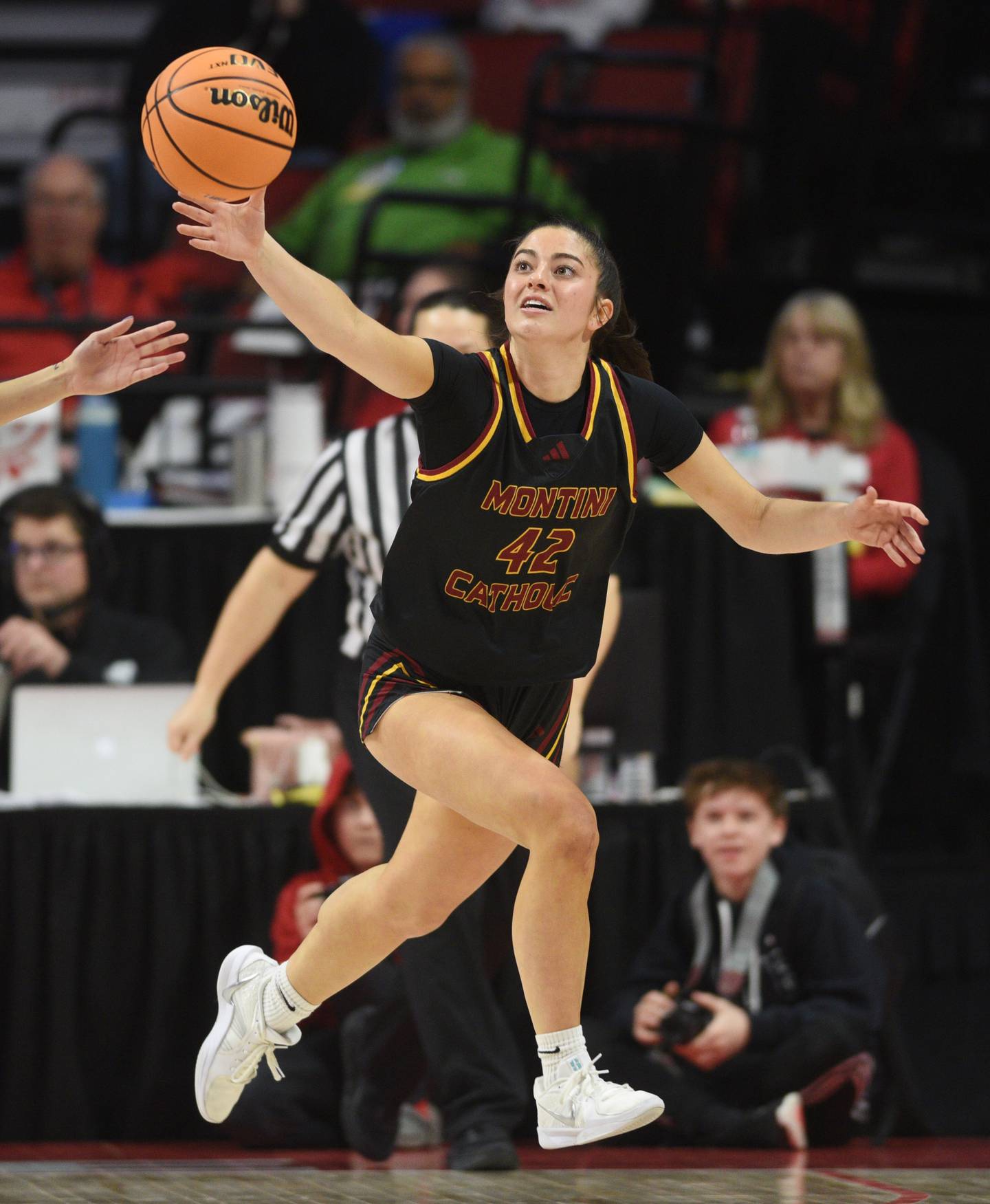 Montini's Natalie Gartlan tries to catch with a rebound during the IHSA Class 3A girls state basketball championship game at CEFCU Arena on Saturday, March 8, 2025 in Normal.