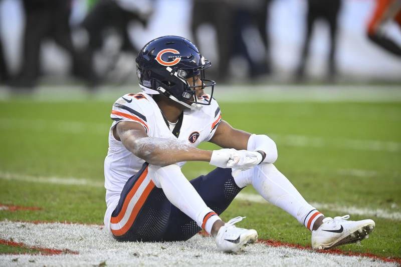 Chicago Bears wide receiver Darnell Mooney sit on the field after an incomplete pass in the second half against the Cleveland Browns in Cleveland, Sunday, Dec. 17, 2023.