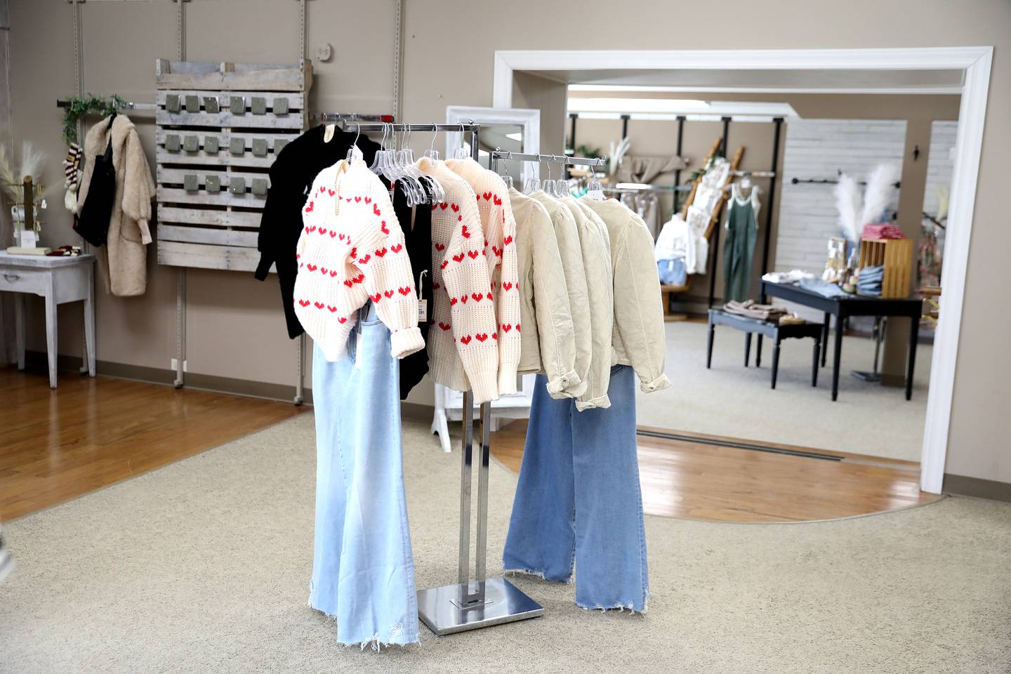Mike and Gabby Plachetka are the new owners of Bella-gia, a contemporary women's clothing boutique, and The Prom Shoppe, in Oswego. They purchased the stores from longtime owners the Kaleel family, who opened American Male in 1977.