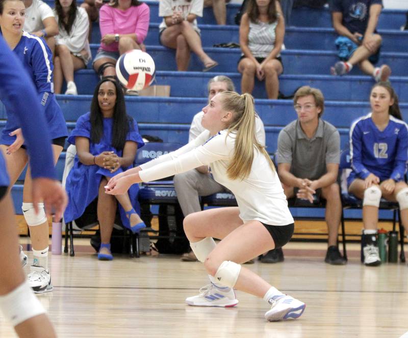 St. Charles North’s Jackie Ruder returns the ball during a game at Rosary in Aurora on Monday, Aug. 21, 2023.