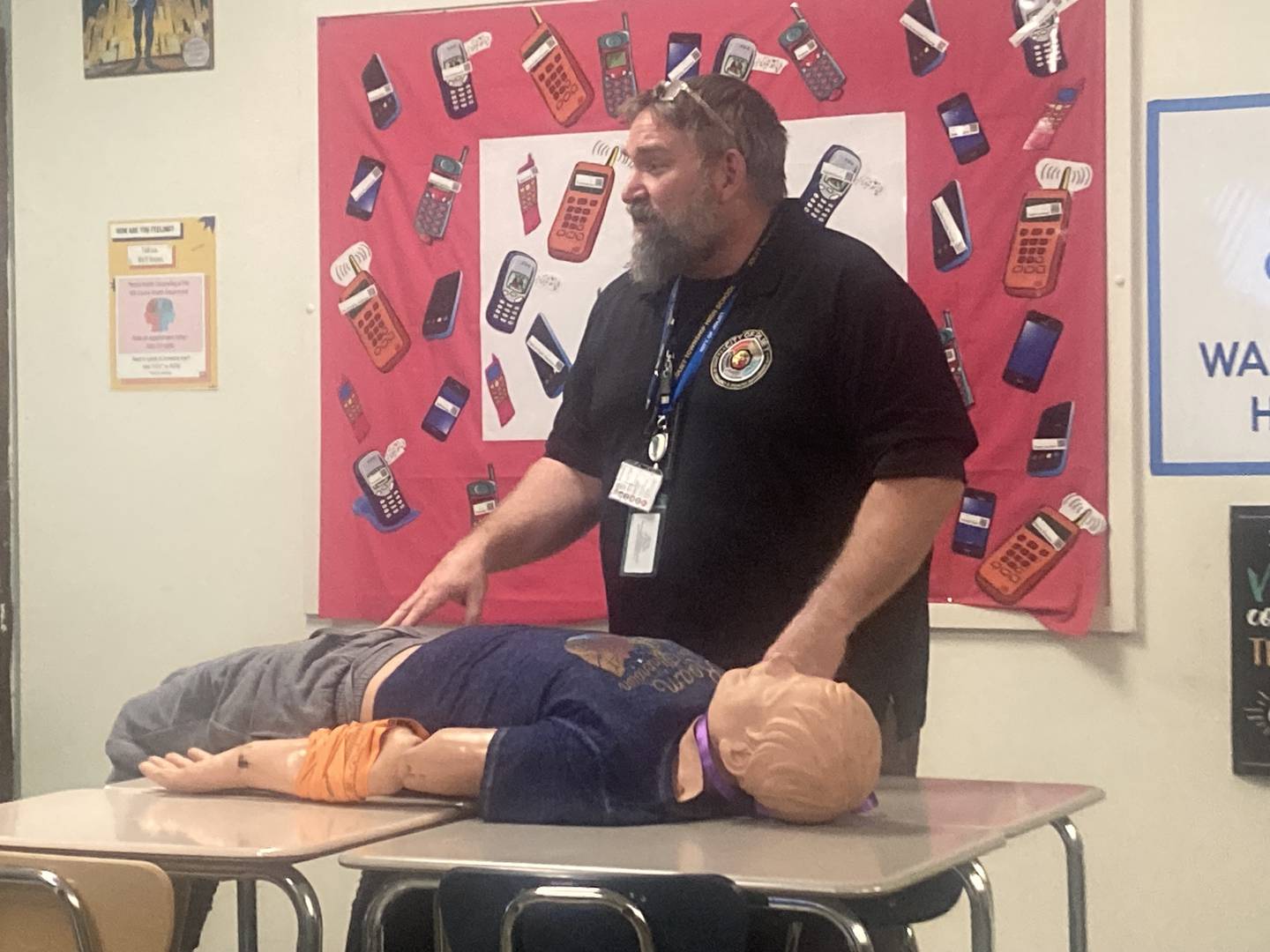 Joliet Office of Emergency and Disaster Management John Lukancic inspects the tourniquet on a dummy treated by CERT students.
Thursday, Dec. 11, 2025.
