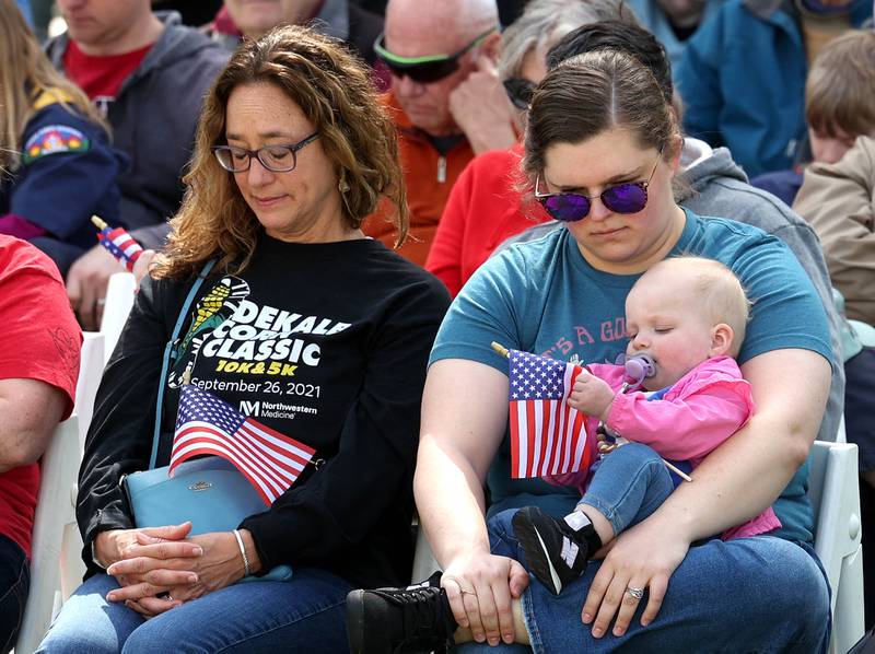 Attendees pray during the invocation Monday, May 26, 2025, at the Memorial Day ceremony at Ellwood House in DeKalb.