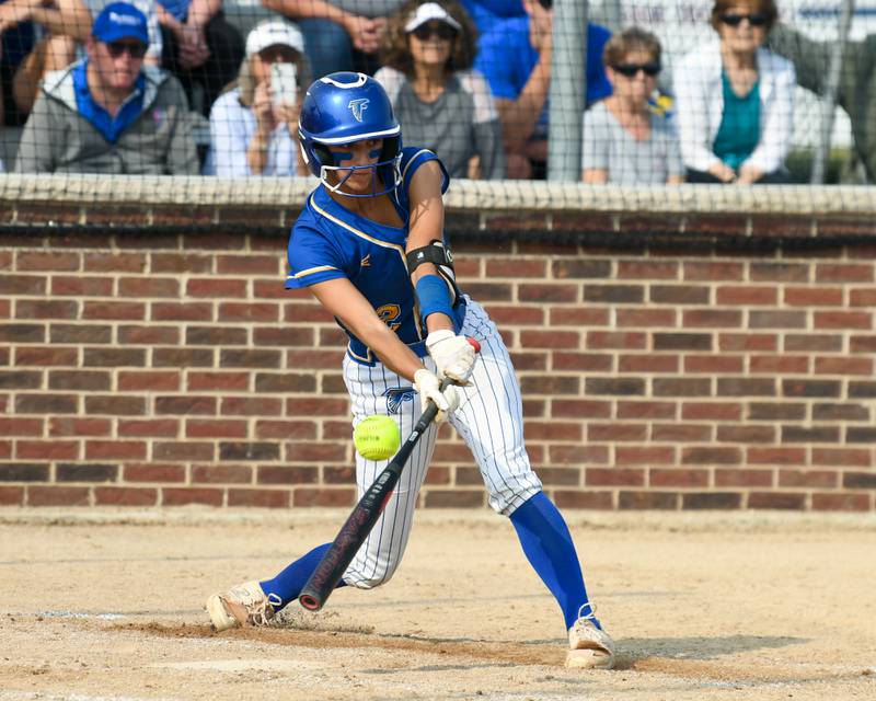 Wheaton North's Abby Del Preto (12) gets a triple during the sectional semifinal game against Weaton Warrenville South on Thursday June 5, 2025, held at Oswego High School.