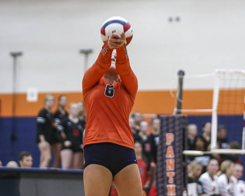 Oswego's Amelia Mosley (6) comes up with a dig save during volleyball match between Yorkville at Oswego. Sept 23, 2025.