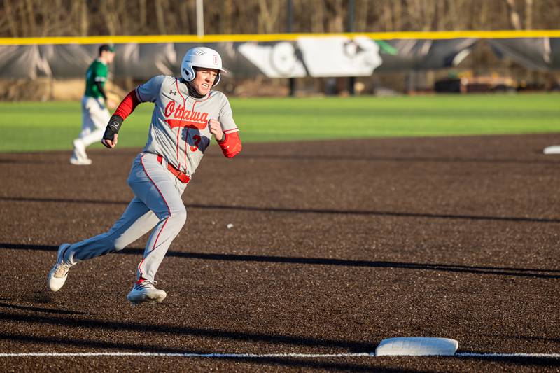 Jaxon Cooper of Ottawa runs towards third base on Monday, March 17, 2025 at Seneca High School in Seneca.