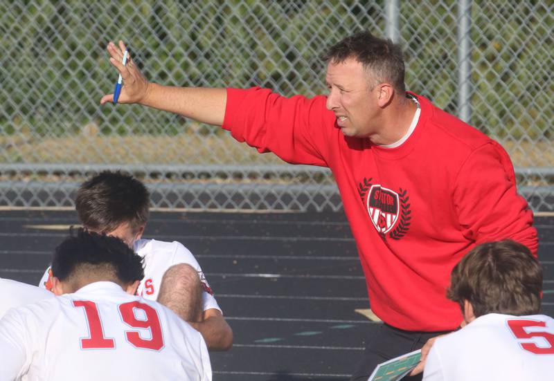 Streator head soccer coach J.T. Huey talks to his team during a timeout while playing Mendota on Monday, Sept. 23, 2024 at Mendota High School.
