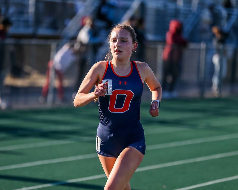 Oswego's Audra Soderlind runs in the 3200 meters at the  Girls Track, Southwest Prairie Conference meet.  May 3, 2023.