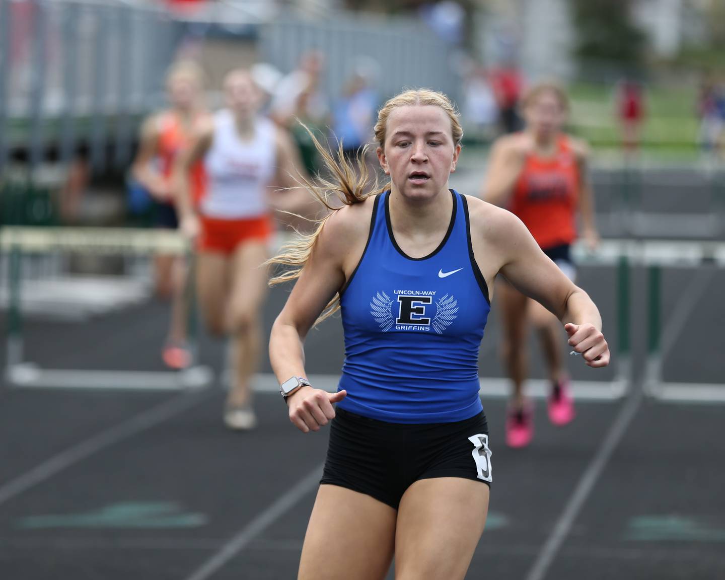 Lincoln-Way East's Sophia Barnard wins in the 100 and 300 hurdles at the Glenbard West's Sue Pariseau Girls Track and Field Invitational.  April 23.2022.