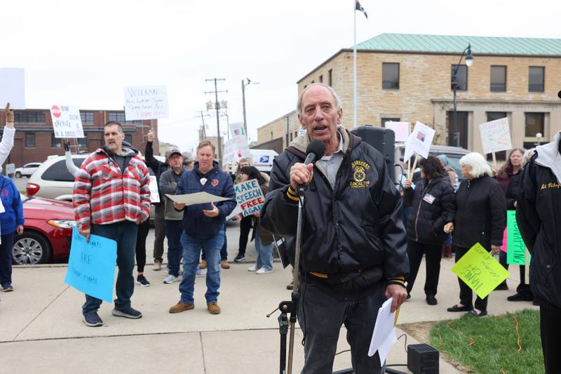 Al Whitmon, vice chairperson of the Kankakee County Democratic Central Committee, of Bourbonnais, welcomes participants at the Hands Off Rally at the Kankakee County Courthouse on Saturday, April 19, 2025.