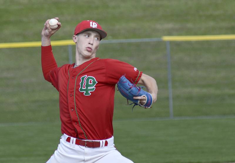 LaSalle Peru starting pitcher Brady Bakes lets go with a pitch against Ottawa Monday at Ottawa.