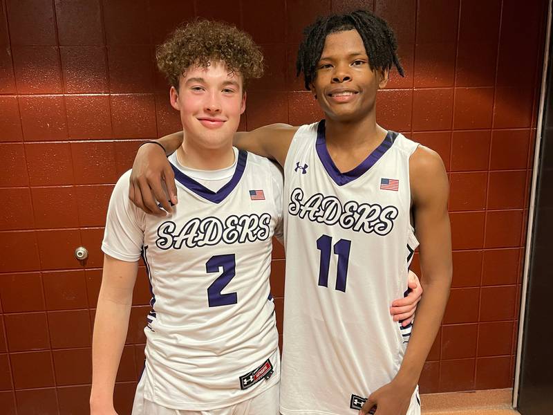 Rockford Lutheran’s Blake Broege (left) and Vontez Dent following their Class 2A sectional semifinal win over Montini on Wednesday.