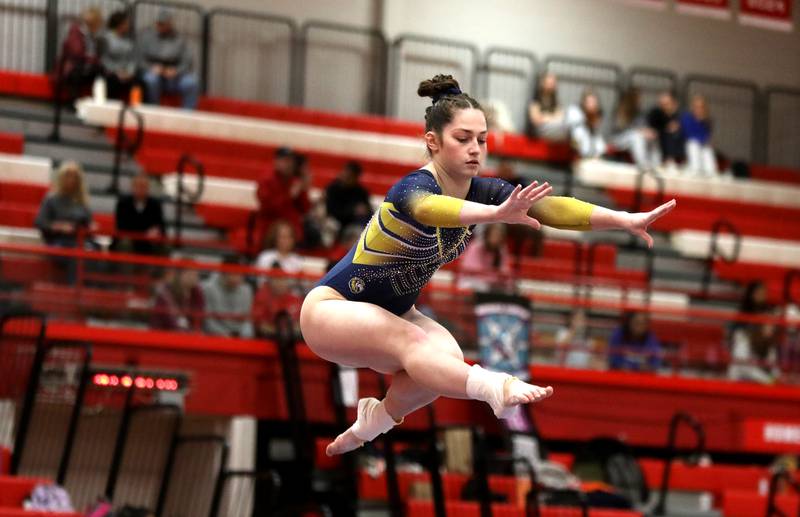 Lyons Township’s Dahlia Highland competes on the balance beam during the Hinsdale Central Sectional on Monday, Feb. 10, 2025 in Hinsdale.