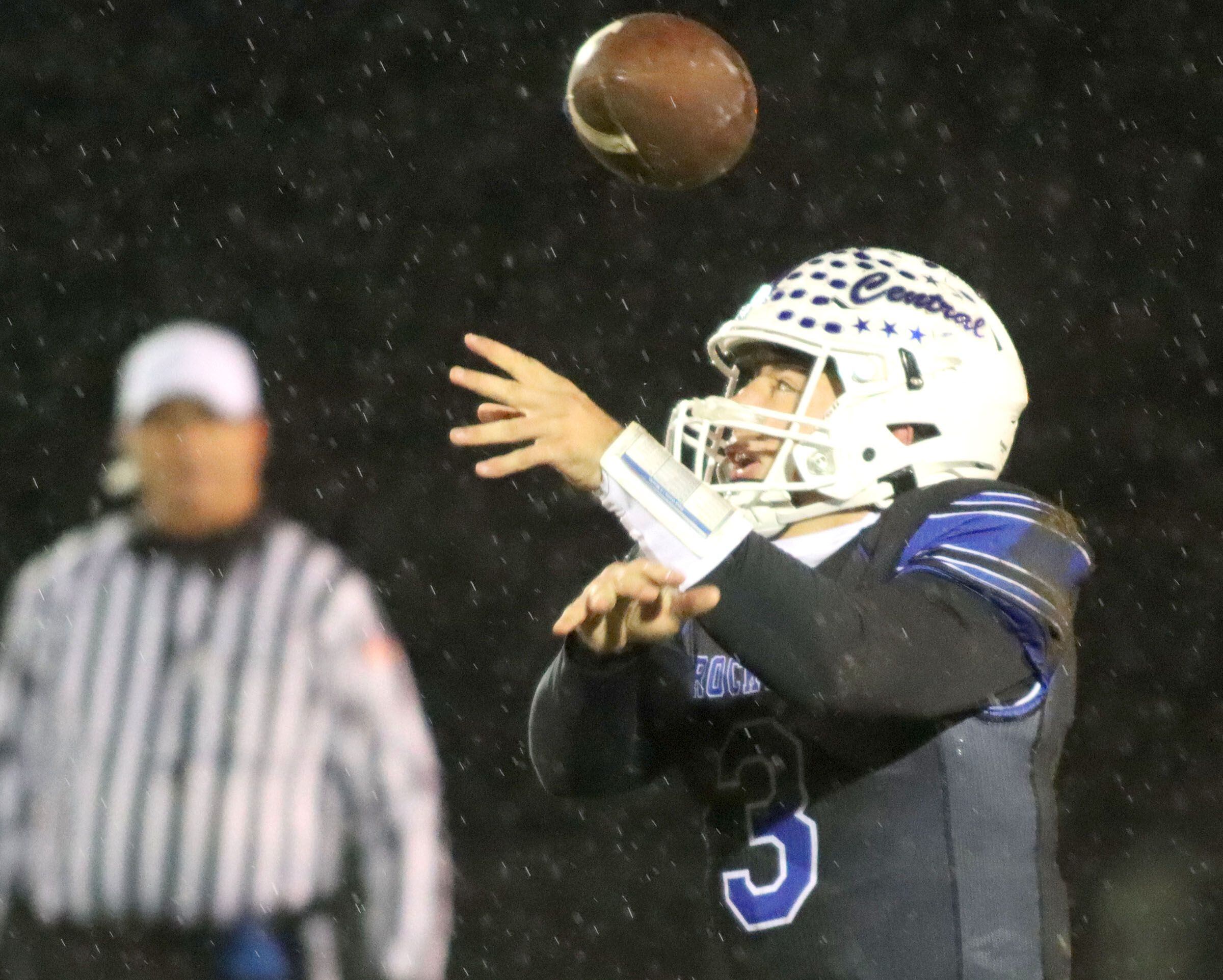 A snap flies past Burlington Central’s Landon Arnold against Harlem in IHSA football Class 6A second-round playoff action at Central High School in Burlington on Saturday, November 8, 2025.