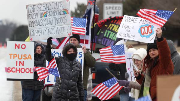 Photos: Protesters gather outside Genoa-Kingston High School during Turning Point USA event
