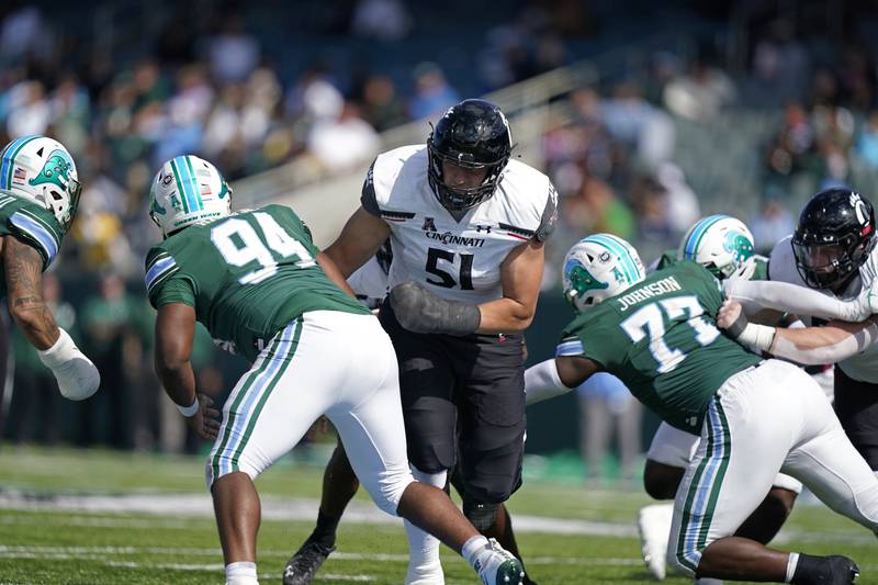 Cincinnati offensive lineman Lorenz Metz blocks against Tulane, Saturday, Oct. 30, 2021, in New Orleans.