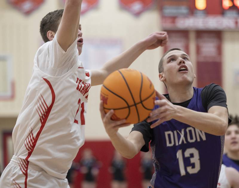 Dixon’s Cullen Shaner works below the basket against Oregon’s Tucker O’Brien Tuesday, Feb. 4, 2025, in Oregon.