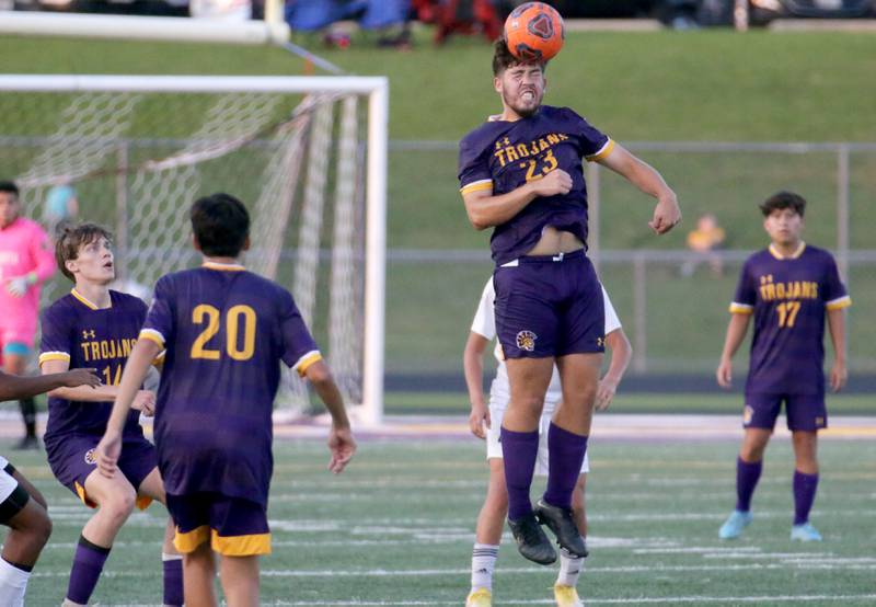 Mendota's David Casas (23) puts a header on the ball against Bloomington Catholic on Wednesday, Sept. 14, 2022 in Mendota.