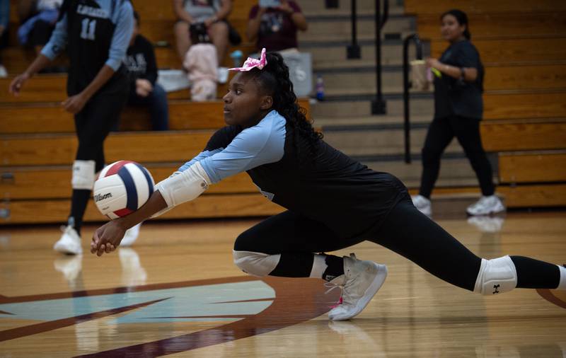 Kankakee's Erin Wills lunges to make a return hit in a match against Bloom on Tuesday, October 14, 2025.