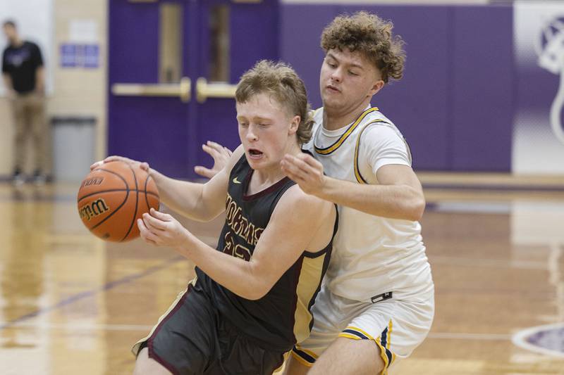 Morris’ Gage Phillips works against Sterling’s Kyle Billings Wednesday, Feb. 22, 2023 in the 3A sectional semifinal game.