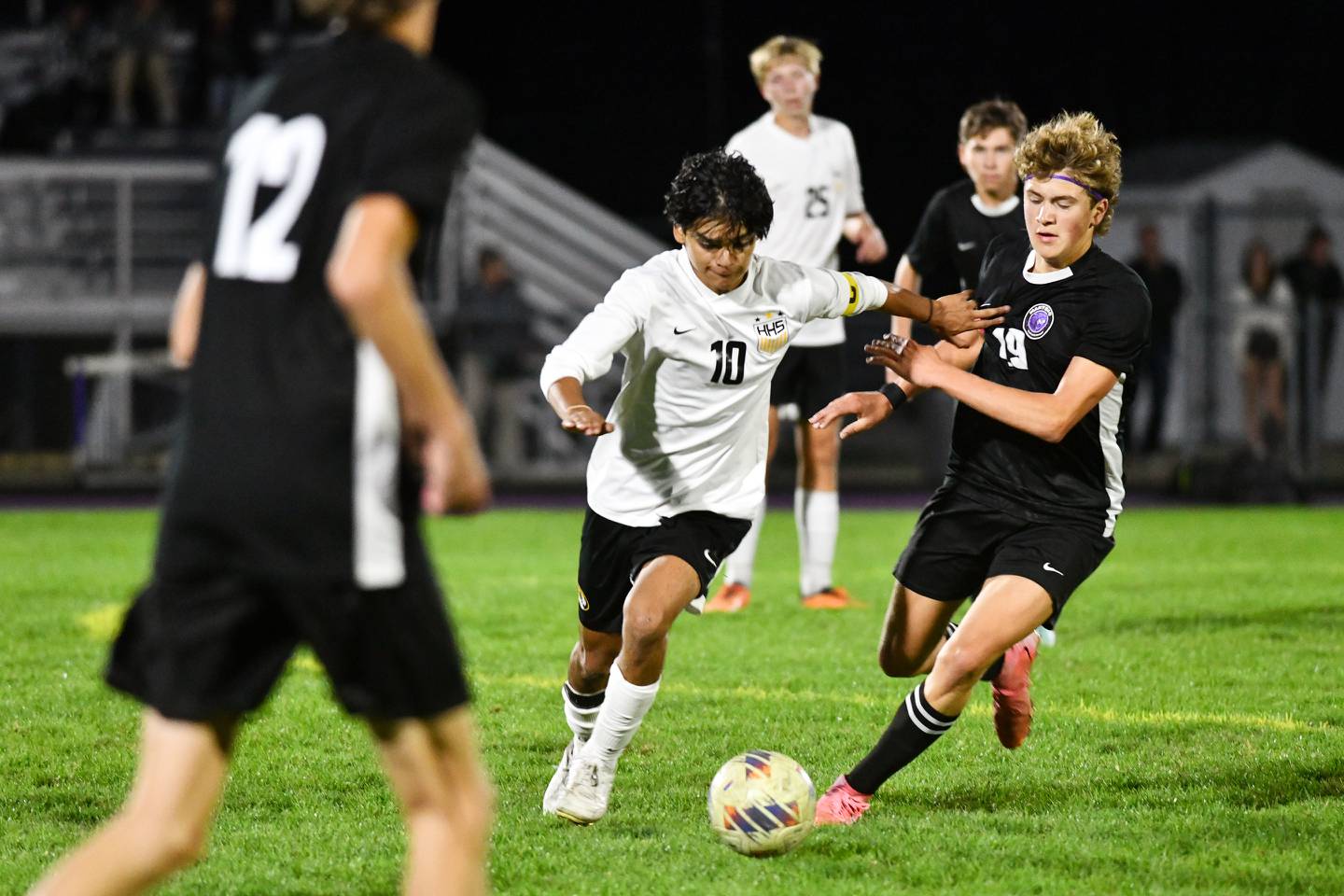 Herscher's Luis Parra makes a run against Manteno's Maddox Toepper during the Tigers' 4-2 victory over Manteno on Oct. 1, 2024. Parra tallied two goals and two assists in the win.
