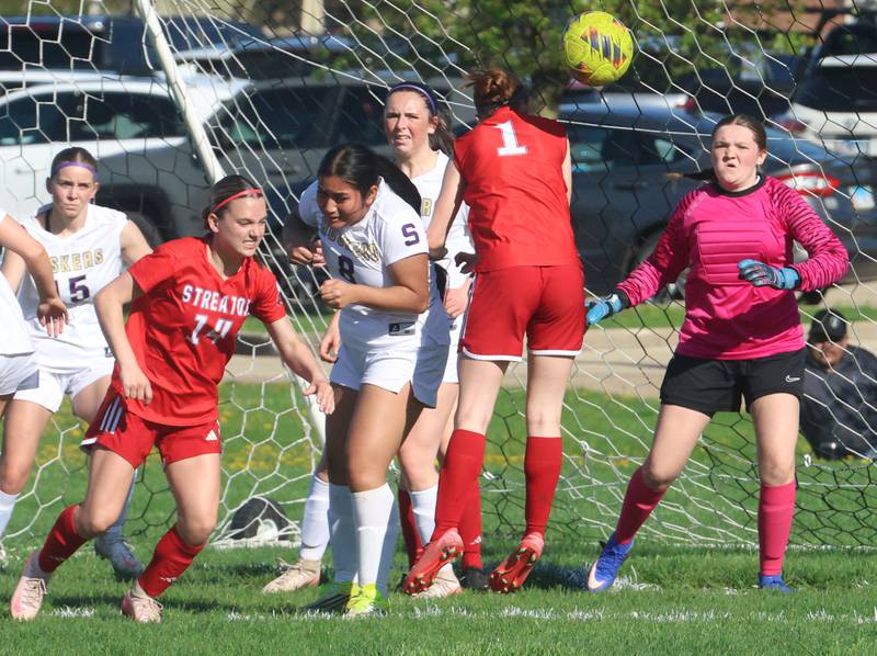 The ball sails over the head of Streator's Lexi Fialko and Kealy Hanafin as Serena/Newak/Earlville's Emma Hernandez and others guard the goal on Thursday, April 16, 2026 at the James Street Recreational Complex in Streator.