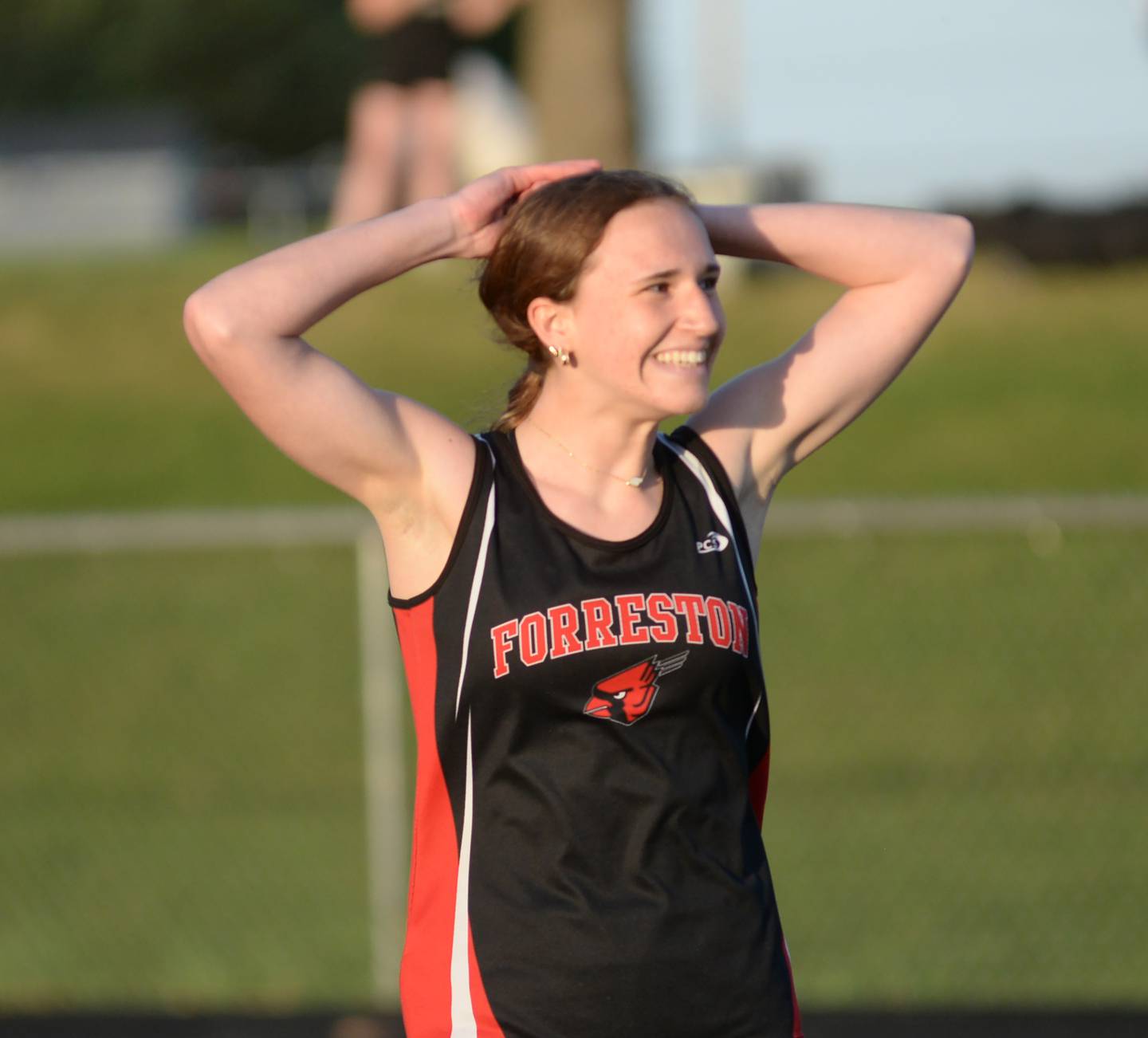 Forreston''s Bree Schneiderman smiles to her fans after finishing second  in the 100 meters at the 1A Lena-Winslow sectional on Thursday, May 15, 2025. She advanced to the state meet this week at Eastern Illinois University in Charleston.
