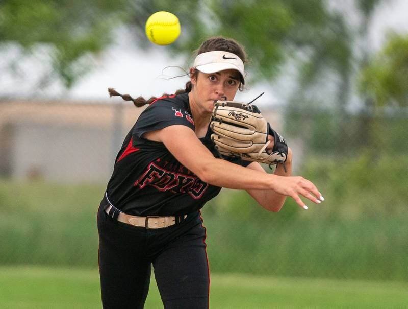 Yorkville's Ellie Alvarez (13) fields the ball and throws to first for an out against Plainfield North during the Class 4A Oswego East Regional softball final at Oswego East High School on Friday, May 27, 2022.