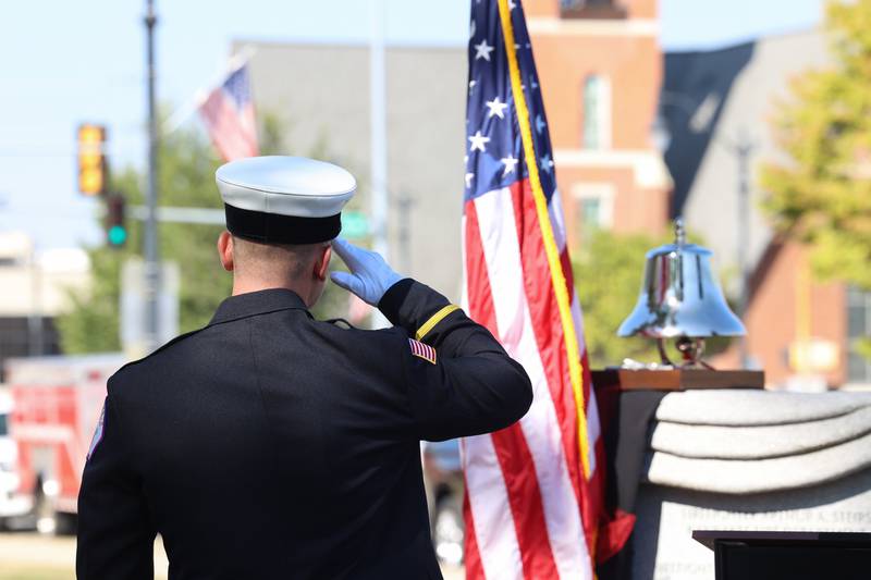 Bourbonnais Fire Protection District Lt. Wyatt Gustafson salutes the flag during the 44th Kankakee County Fallen Firefighter Memorial Service on Friday, Oct. 3, 2025. Porter also serves as the Bradley Fire Department deputy chief.