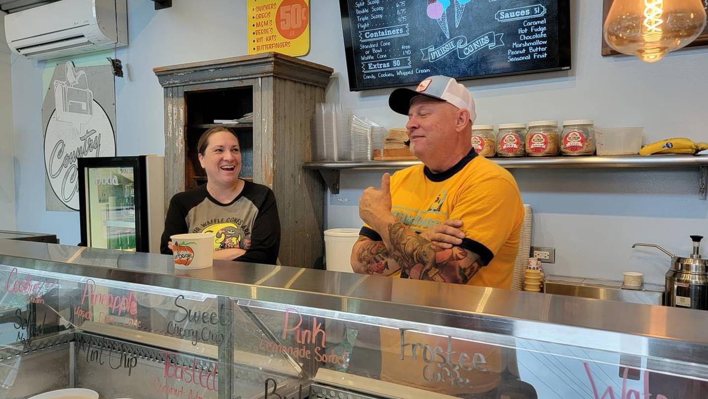 Brook and Clint Carey, owners of the Milk House in Pingree Grove share a laugh.