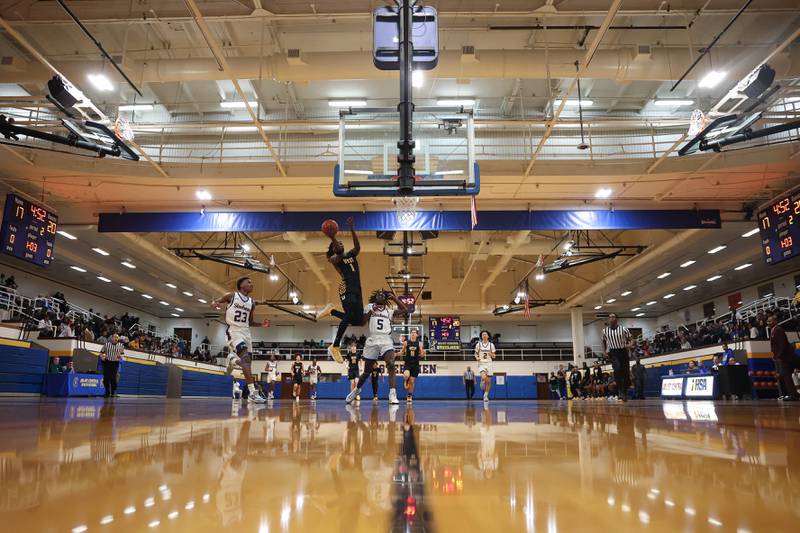 Joliet West’s Justus McNair goes in for the basket against Joliet Central on Saturday, Jan. 27th, 2024 in Joliet.