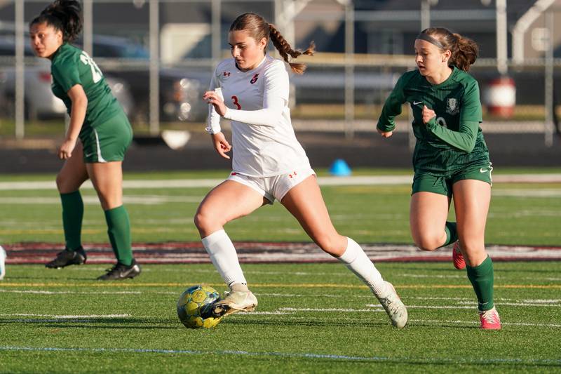 Oswego’s Mane Brolley plays the ball against Bartlett during a soccer mach in the Plainfield Classic at Plainfield North High School on Tuesday, April 15, 2025.