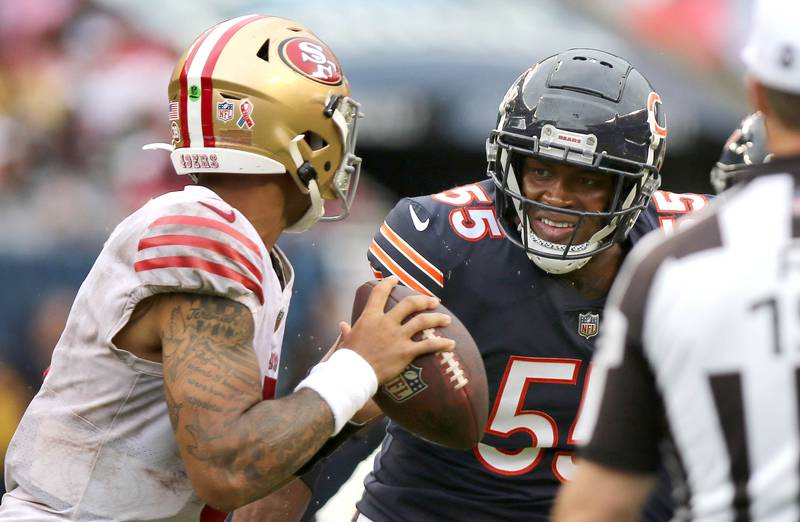 Chicago Bears defensive end Al-Quadin Muhammad pressure San Francisco 49ers quarterback Trey Lance during their game Sunday, Sept. 11, 2022, at Soldier Field in Chicago.
