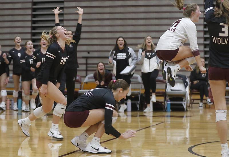 Prairie Ridge players celebrate their win over Crystal Lake South in the IHSA Class 3A Prairie Ridge Regional championship volleyball match on Thursday, Oct. 30, 2025, at the Prairie Ridge High School in Crystal Lake.