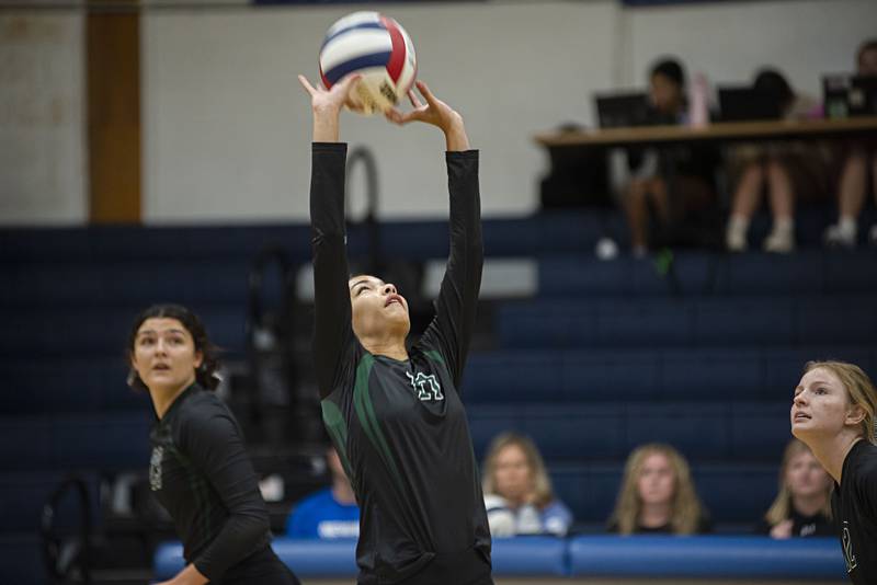 St. Bede’s Amanda Wojcik sets the ball against Newman Tuesday, Sept. 27, 2022.