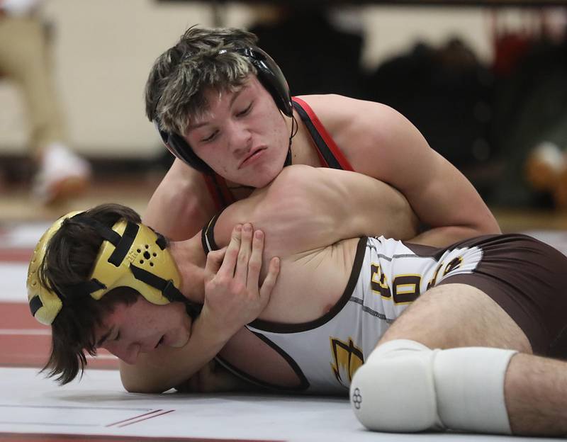 Huntley’s Alex Vega controls Jacobs’ Vassil Vesselinov during the 165—pound match of a Fox Valley Conference wrestling meet on Thursday, Dec. 11, 2025, at Huntley High School.