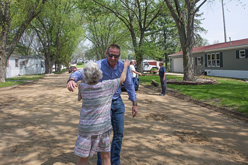 New owner Quan Rees greets Mammosser while making a visit to the property Tuesday, May 10, 2022.