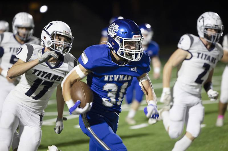 Newman’s Cody McBride runs the ball against Monmouth-Roseville Friday, Oct. 25, 2024, at Roscoe Eades Stadium in Sterling.