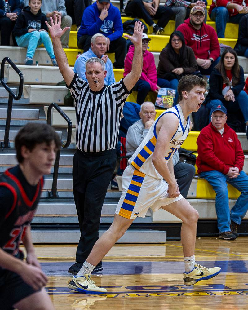 Danny Loud (34) of Johnsburg celebrates after scoring 3-pointer against Aurora Christian during the Class 2A Boys Sectional Basketball tournament game on Wednesday, March 4, 2026 at Mendota High School.