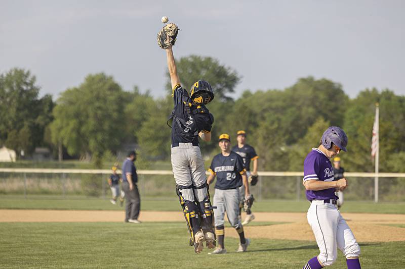 Sterling’s Ayden Schoon leaps for an overthrown ball against Rochelle in class 3A regional action on Monday, May 22, 2023.