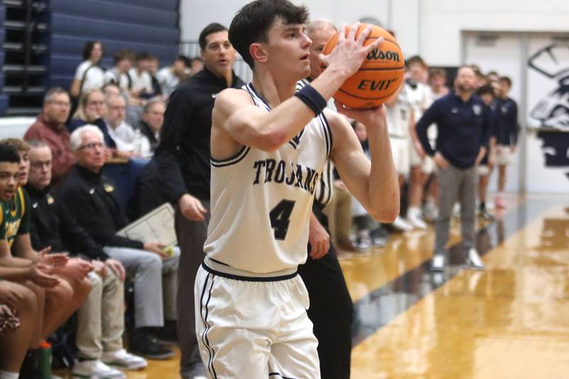 Cary-Grove’s Dylan Dumele takes an outside shot against  Crystal Lake South in varsity boys basketball on Wednesday, Dec. 3, 2025, at Cary-Grove High School in Cary.