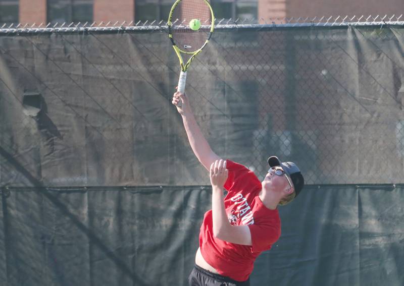 Ottawa's Tucker Ditchfield plays tennis against L-P at the Henderson-Guenther Tennis Facility on Monday, Monday, May 6, 2024 at Ottawa High School.