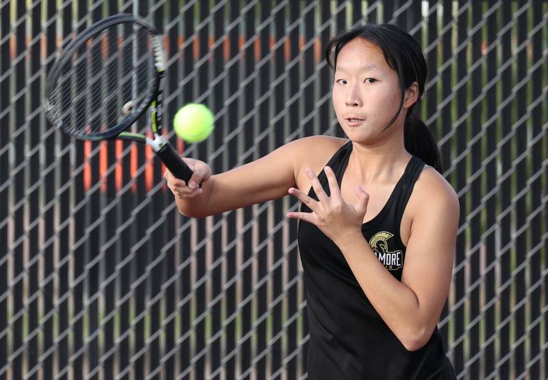 Sycamore’s Jeanny Ni hits a forehand during her match against DeKalb Wednesday, Sept. 13, 2023, at DeKalb High School.